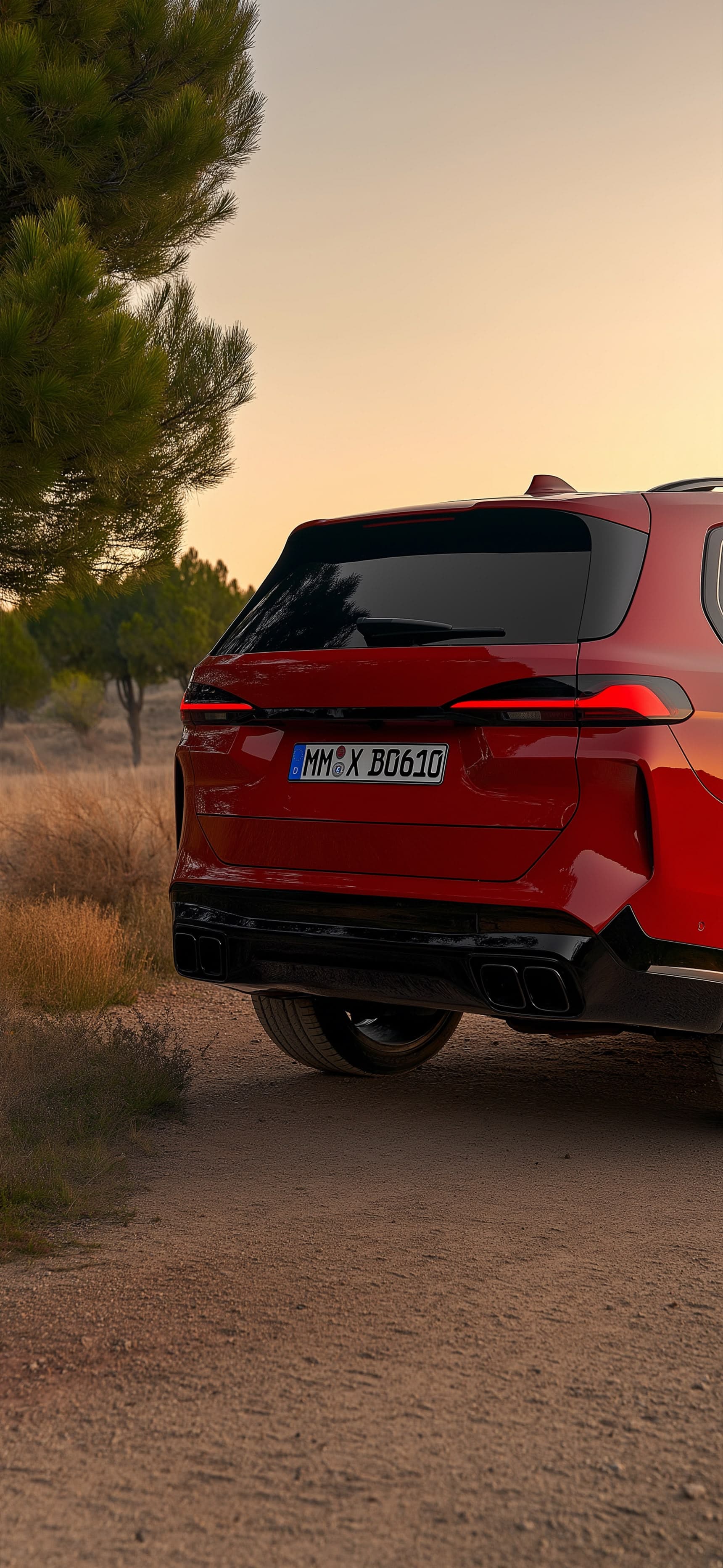 Red Car on dirt road - free phone wallpaper