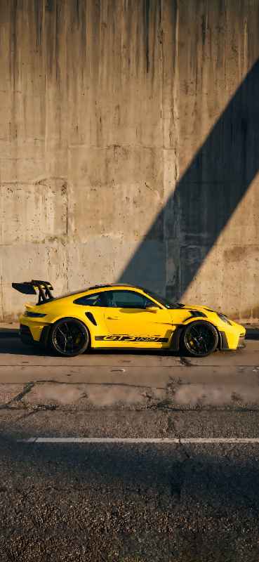 Sleek Yellow Racer - free phone wallpaper download