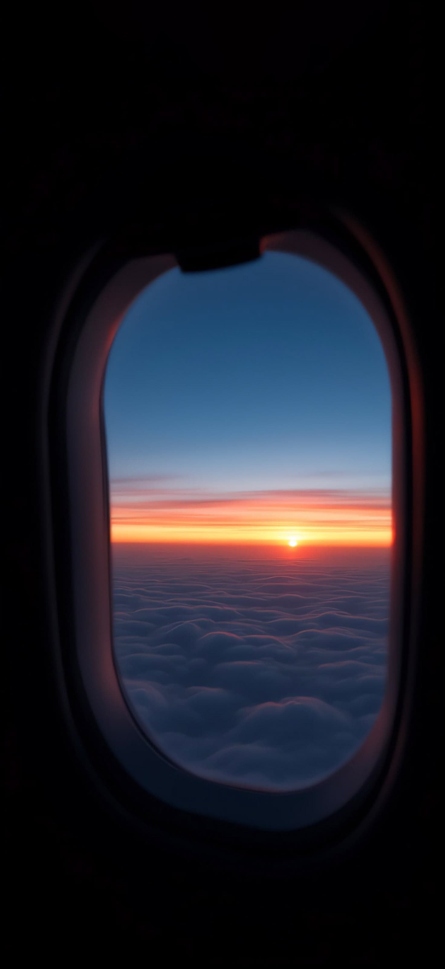 Window Seat Sunset 2 - free phone wallpaper