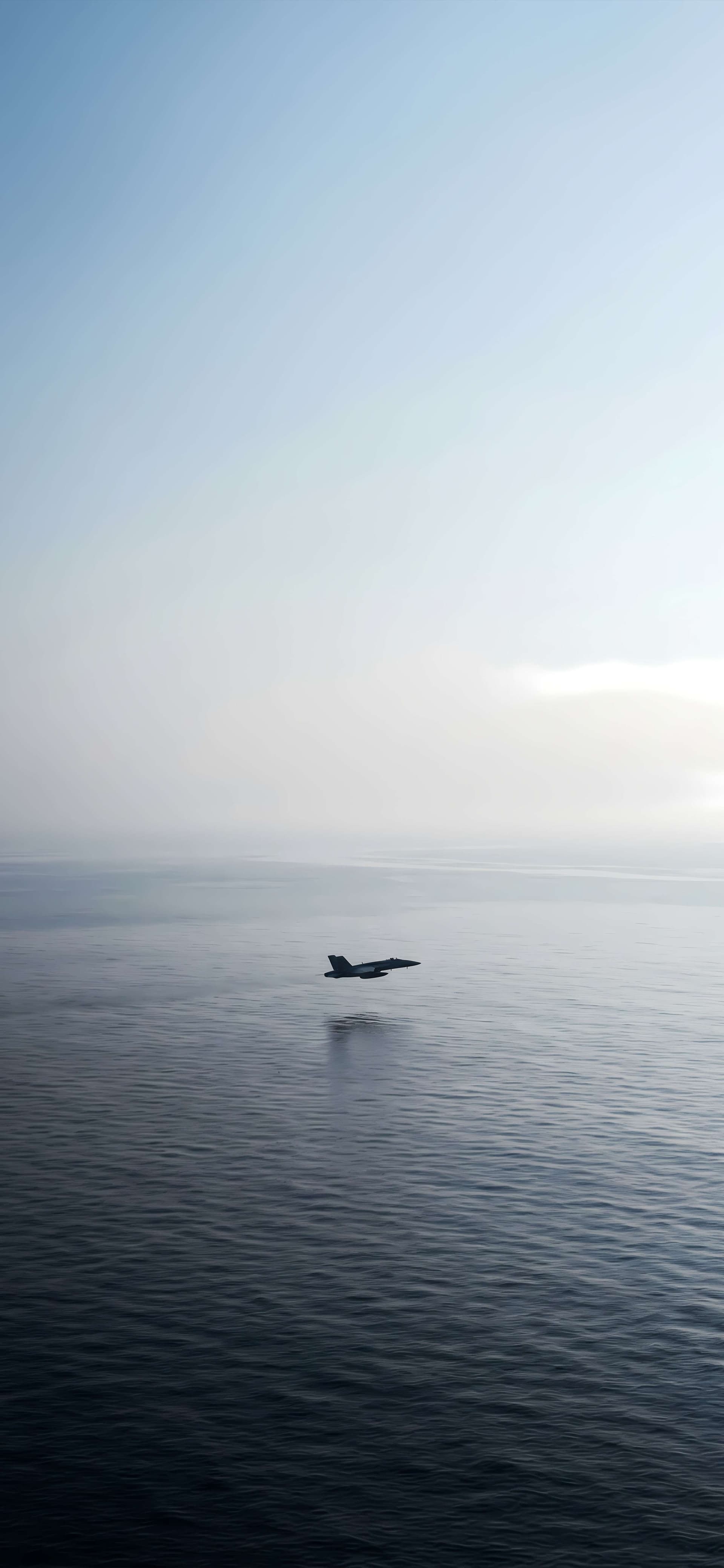 Jet Over Ocean - Pro phone wallpaper