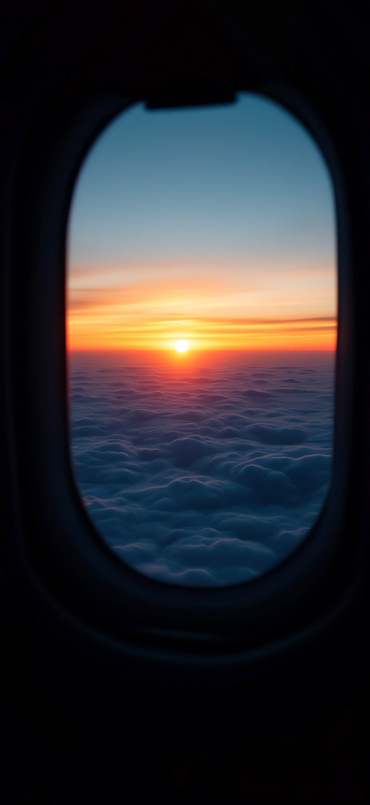 Window Seat Sunset 1 - free phone wallpaper