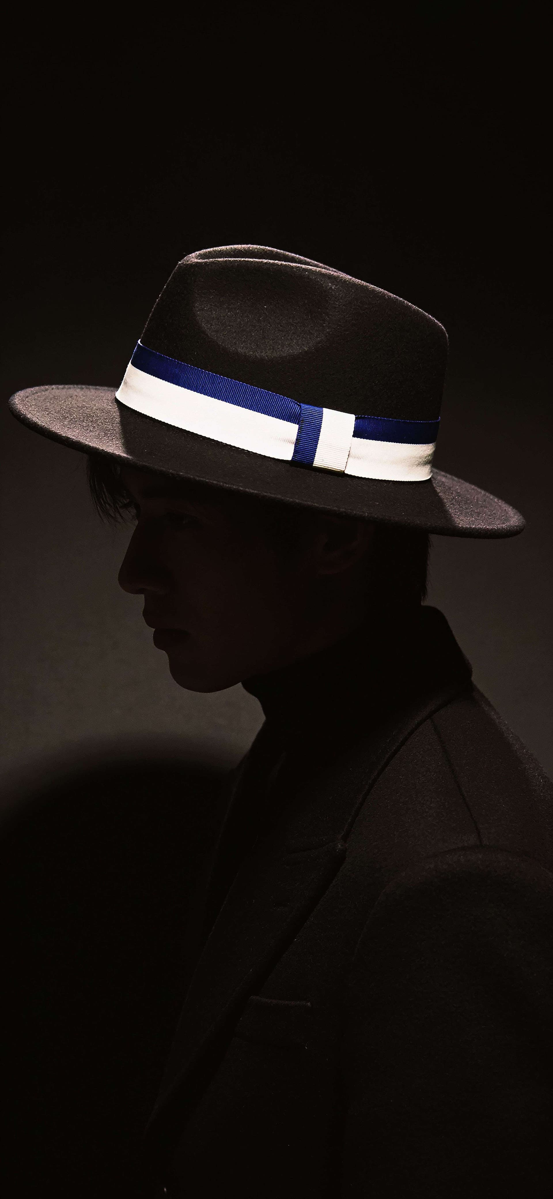 Shadowed Fedora Portrait - free phone wallpaper