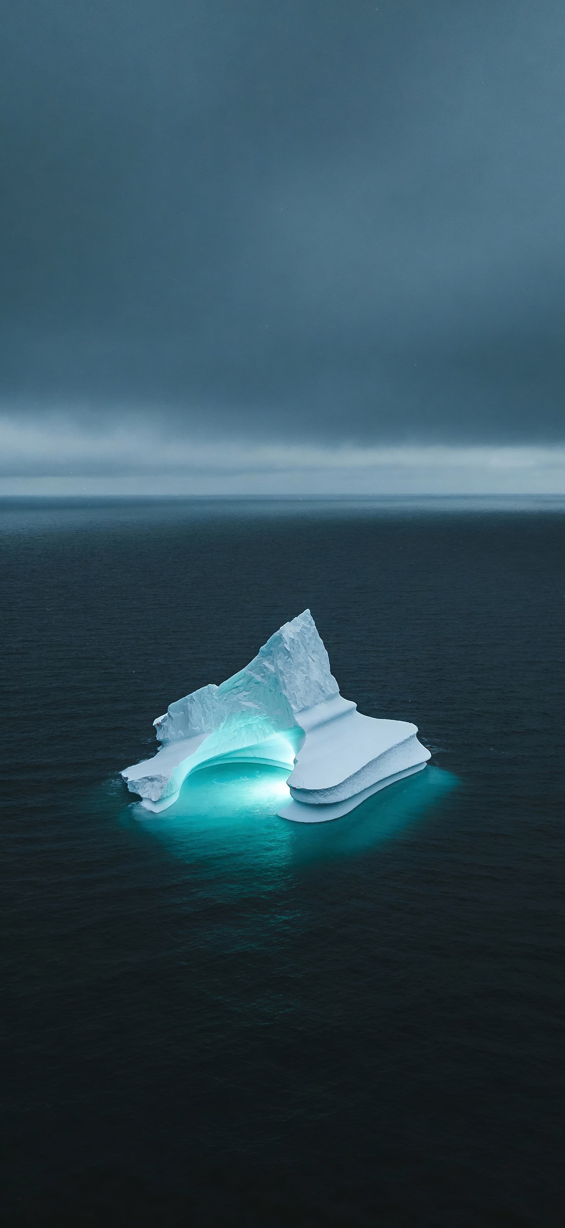 Glowing Iceberg Night - free phone wallpaper